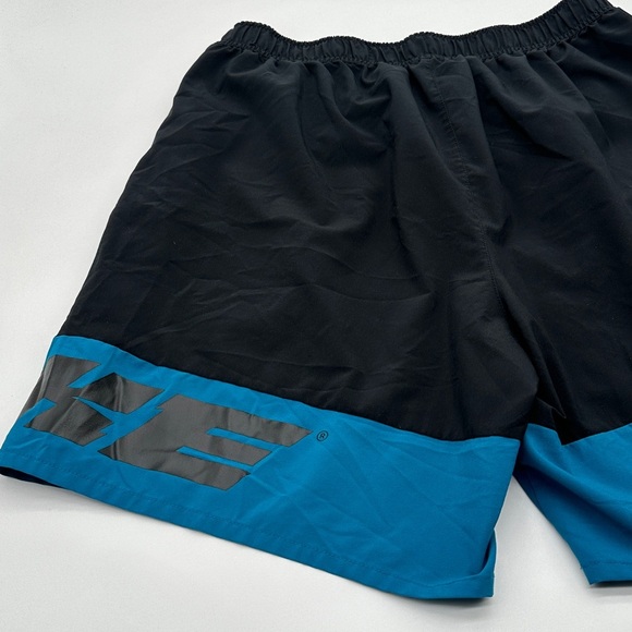 NIKE Sport Clash Logo Training Shorts Medium Black Green Abyss - Picture 5 of 6